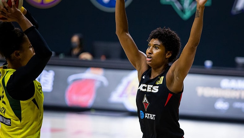 Oct 2, 2020; Bradenton, Florida, USA; Las Vegas Aces forward Angel McCoughtry (35) defends against an inbound pass from Seattle Storm forward Alysha Clark (32) during game 1 of the WNBA finals at IMG Academy. Mandatory Credit: Mary Holt-USA TODAY Sports