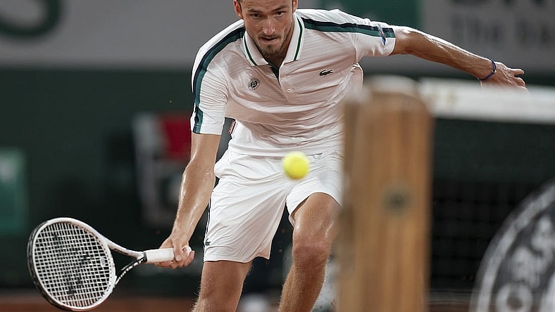 Jun 8, 2021; Paris, France; Daniil Medvedev (RUS) in action during his match against Stefanos Tsitsipas (GRE) on day 10 of the French Open at Stade Roland Garros. Mandatory Credit: Susan Mullane-USA TODAY Sports