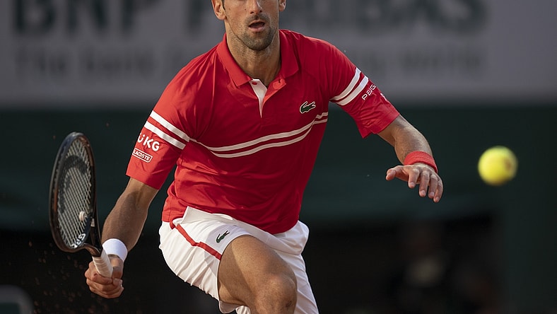 Jun 13, 2021; Paris, France; Novak Djokovic (SRB) in action during the men's final against Stefanos Tsitsipas (GRE) on day 15 of the French Open at Stade Roland Garros. Mandatory Credit: Susan Mullane-USA TODAY Sports