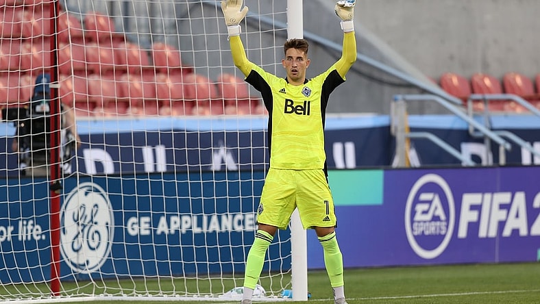 Jul 17, 2021; Sandy, Utah, USA; Vancouver Whitecaps goalkeeper Thomas Hasal (1) instructs his team during the first half of a match against the Los Angeles Galaxy at Rio Tinto Stadium. Mandatory Credit: Rob Gray-USA TODAY Sports