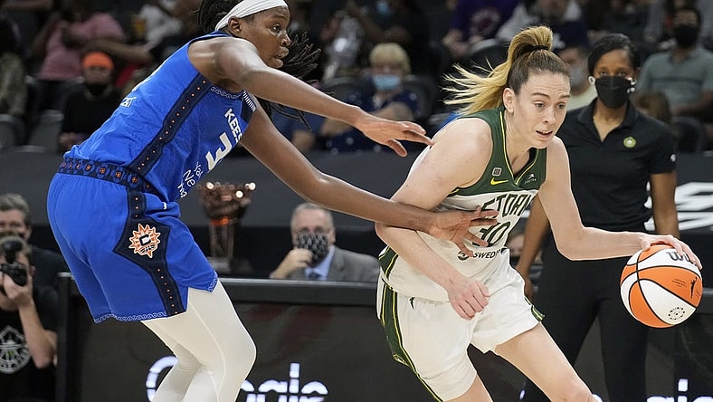 Aug 12, 2021; Phoenix, Arizona, USA; Seattle Storm forward Breanna Stewart (30) drives against Connecticut Sun forward Kaila Charles (left) in the first half during the Inaugural WNBA Commissioners Cup Championship Game at Footprint Center. Mandatory Credit: Rick Scuteri-USA TODAY Sports