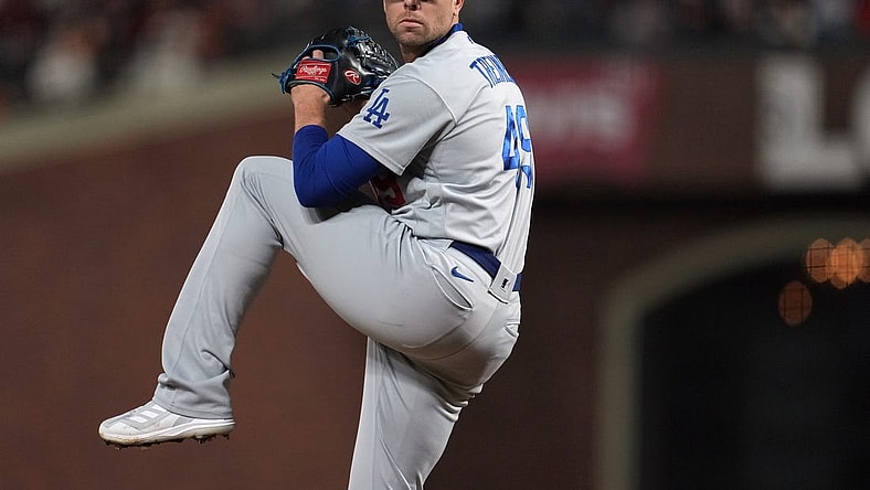 Oct 14, 2021; San Francisco, California, USA; Los Angeles Dodgers relief pitcher Blake Treinen (49) throws against the San Francisco Giants during the seventh inning in game five of the 2021 NLDS at Oracle Park. Mandatory Credit: Neville E. Guard-USA TODAY Sports