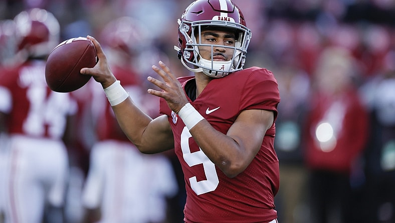 Nov 6, 2021; Tuscaloosa, Alabama, USA; Alabama Crimson Tide quarterback Bryce Young (9) warms up before the start against the LSU Tigers at Bryant-Denny Stadium. Mandatory Credit: Butch Dill-USA TODAY Sports