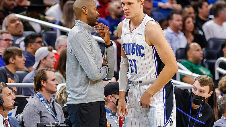 Nov 13, 2021; Orlando, Florida, USA; Orlando Magic head coach Jamahl Mosley talks to center Moritz Wagner (21) during the second quarter at Amway Center. Mandatory Credit: Mike Watters-USA TODAY Sports