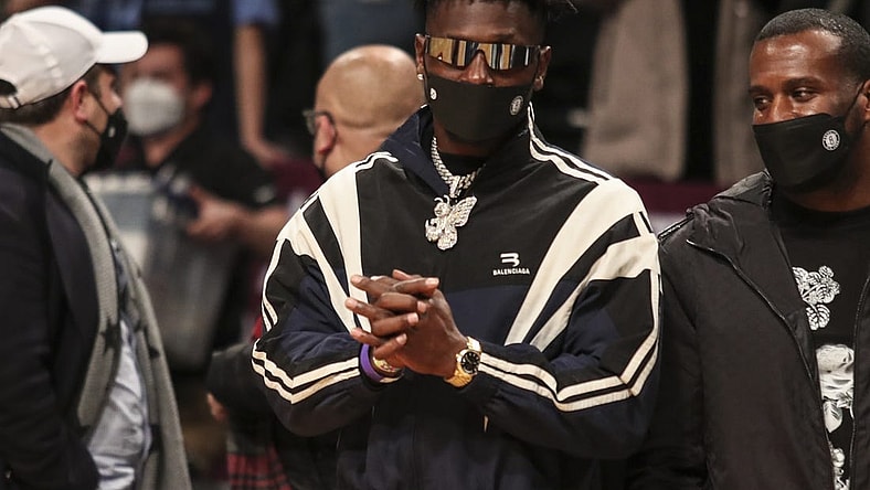 Jan 3, 2022; Brooklyn, New York, USA;  Former NFL wide receiver Antonio Brown watches the game between the Memphis Grizzlies and the Brooklyn Nets at Barclays Center. Mandatory Credit: Wendell Cruz-USA TODAY Sports