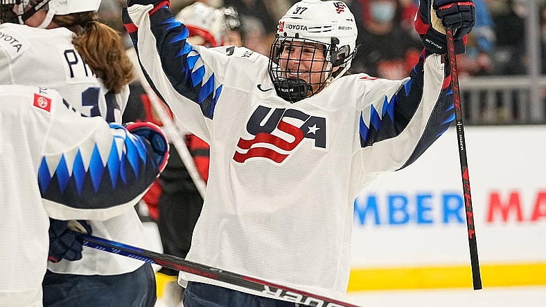 Nov 21, 2021; Kingston, Ontario, CAN; USA forward Abbey Murphy (37) celebrates a win over Canada in overtime of a Rivalry Series women's hockey game at Leon's Centre. Mandatory Credit: John E. Sokolowski-USA TODAY Sports