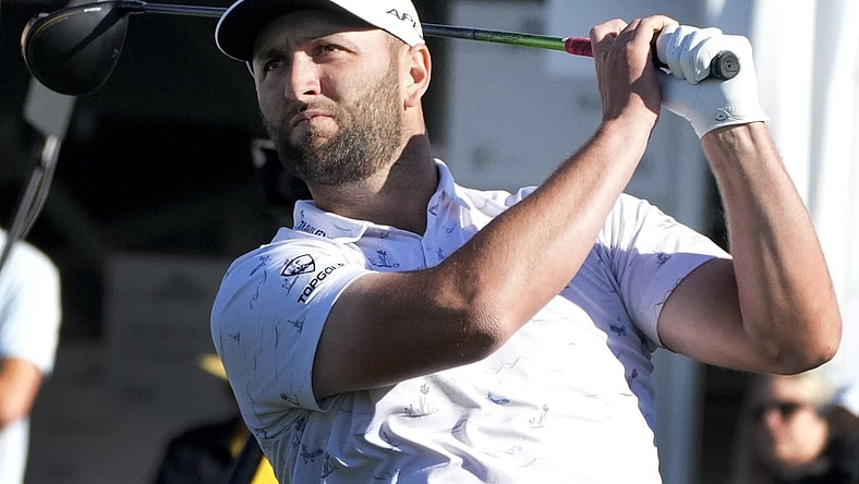 Feb 9, 2022; Scottsdale, AZ, USA;  Pro golfer Jon Rahm, watches his ball from the 10th tee box during the WM Phoenix Open Annexus Pro-Am at TPC Scottsdale.

Golf Wm Phoenix Open Day 3