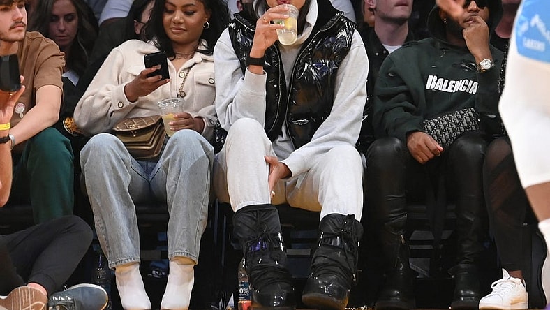 Feb 25, 2022; Los Angeles, California, USA;  Los Angeles Sparks Liz Cambage, center, attends the game between the Los Angeles Lakers and the Los Angeles Clippers at Crypto.com Arena. Mandatory Credit: Jayne Kamin-Oncea-USA TODAY Sports