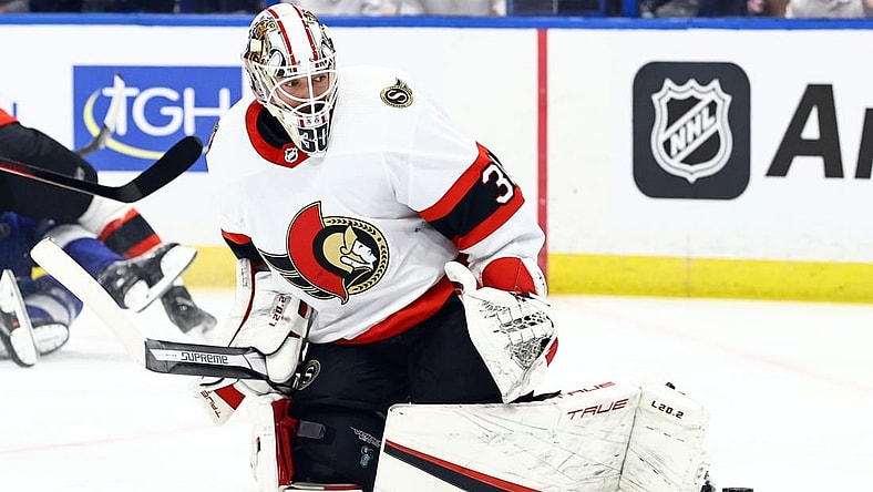 Mar 1, 2022; Tampa, Florida, USA; Ottawa Senators goaltender Matt Murray (30) makes a save against the Tampa Bay Lightning during the first period at Amalie Arena. Mandatory Credit: Kim Klement-USA TODAY Sports