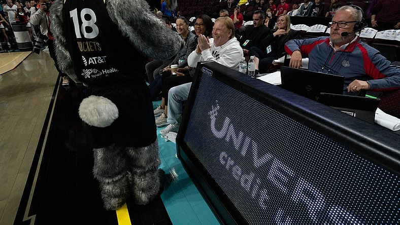 March 8, 2022; Las Vegas, NV, USA; Las Vegas Aces mascot Buckets and owner Mark Davis during the first half in the finals of the WCC Basketball Championships at Orleans Arena. Mandatory Credit: Kyle Terada-USA TODAY Sports