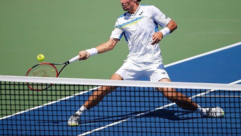 Alexandr Dolgopolov, of Ukraine, approaches the net in the second set to return a shot to Novak Djokovic, of Serbia, their semifinal match, Saturday, Aug. 22, 2015, at the Lindner Family Tennis Center in Mason, Ohio.

Xxx 082215 Tennis 06 Jpg S Ten Usa Oh