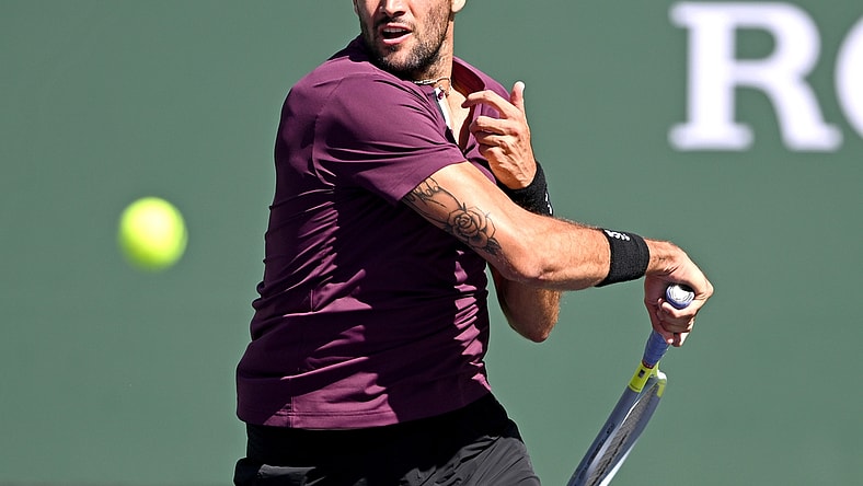 Mar 16, 2022; Indian Wells, CA, USA; Matteo Berrettini (ITA) hits a shot during his fourth round match against Miomir Kecmanovic (not pictured) at the BNP Paribas Open at the Indian Wells Tennis Garden. Mandatory Credit: Jayne Kamin-Oncea-USA TODAY Sports