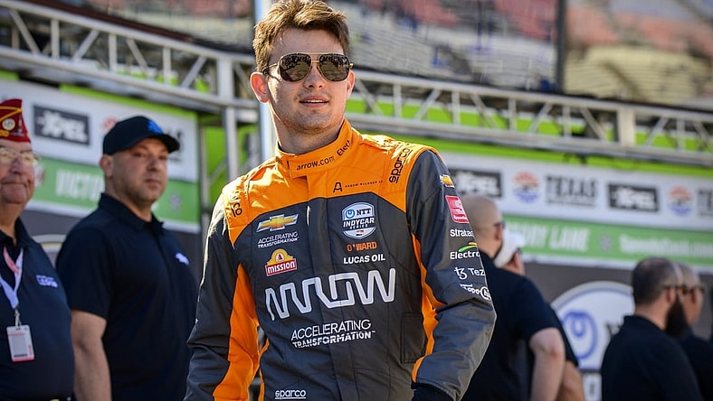 Mar 20, 2022; Fort Worth, Texas, USA; Arrow McLaren SP driver Pato O'Ward (5) of Mexico is introduced before the start of the NTT IndyCar Series XPEL 375 race at Texas Motor Speedway. Mandatory Credit: Jerome Miron-USA TODAY Sports
