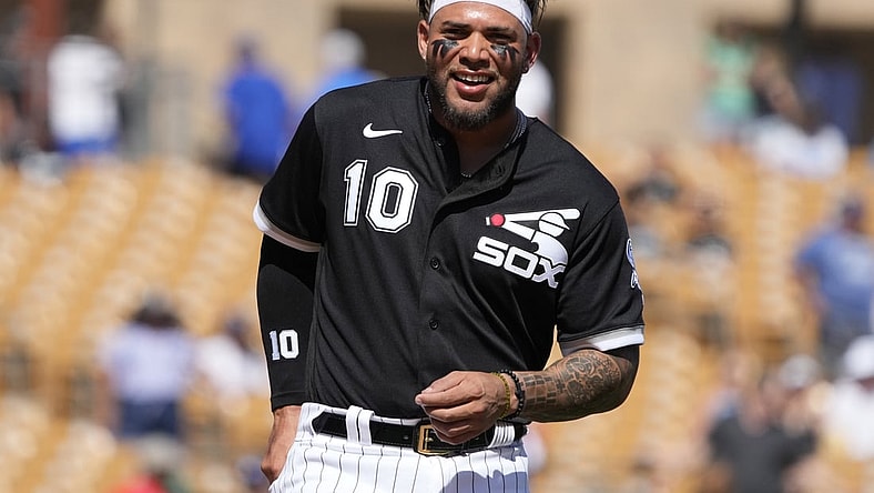 Mar 21, 2022; Phoenix, Arizona, USA; Chicago White Sox third baseman Yoan Moncada (10) gets ready to field against the Los Angeles Dodgers in the third inning during a spring training game at Camelback Ranch-Glendale. Mandatory Credit: Rick Scuteri-USA TODAY Sports