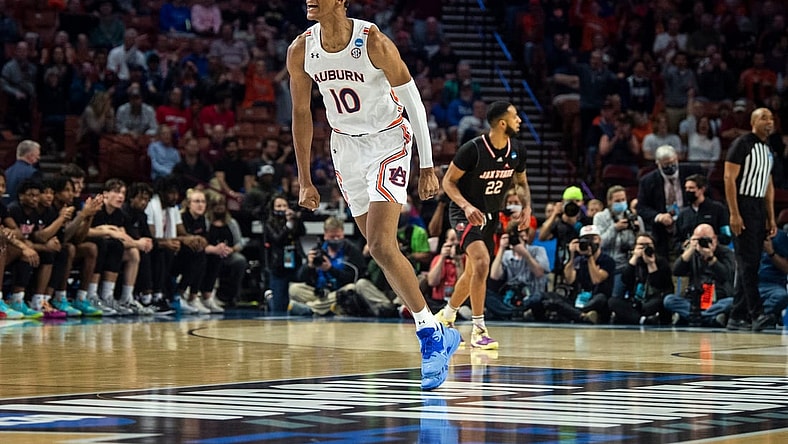 Auburn Tigers forward Jabari Smith (10) celebrates after making a three point basket during the first round of the 2022 NCAA tournament at Bon Secours Wellness Arena in Greenville, S.C., on Friday, March 18, 2022. Auburn Tigers lead Jacksonville State Gamecocks 39-27 at halftime.
