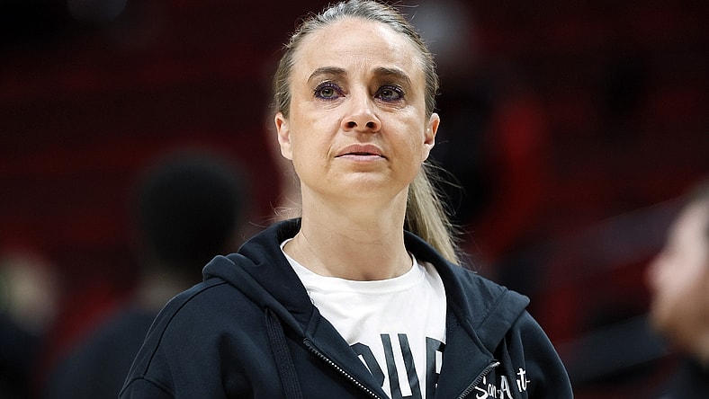 Mar 23, 2022; Portland, Oregon, USA; San Antonio Spurs assistant coach Becky Hammon watches the warm-up before a game against the Portland Trail Blazers at Moda Center. Mandatory Credit: Soobum Im-USA TODAY Sports