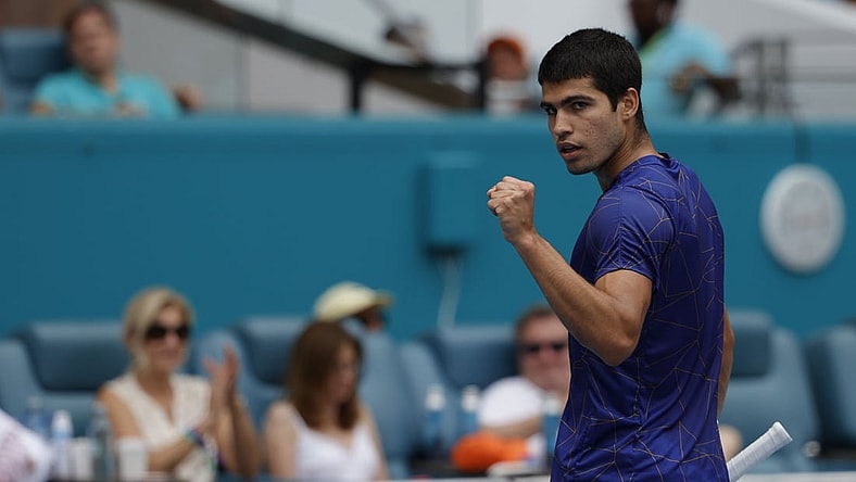 Apr 3, 2022; Miami Gardens, FL, USA; Carlos Alcaraz (ESP) reacts after winning a point against Casper Ruud (NOR)(not pictured) in the men's singles final in the Miami Open at Hard Rock Stadium. Mandatory Credit: Geoff Burke-USA TODAY Sports
