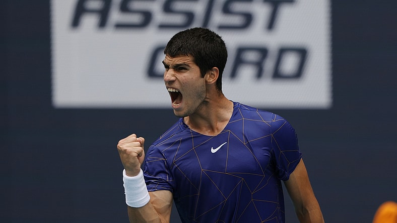 Apr 3, 2022; Miami Gardens, FL, USA; Carlos Alcaraz (ESP) reacts after winning a point against Casper Ruud (NOR)(not pictured) in the men's singles final in the Miami Open at Hard Rock Stadium. Mandatory Credit: Geoff Burke-USA TODAY Sports