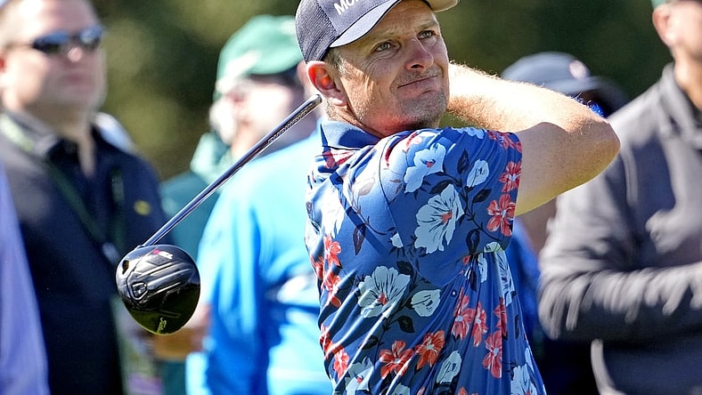 Apr 8, 2022; Augusta, Georgia, USA; Justin Rose plays his shot from the eighth tee during the second round of The Masters golf tournament. Mandatory Credit: Michael Madrid-USA TODAY Sports