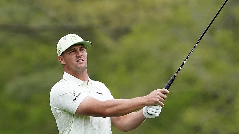 Apr 8, 2022; Augusta, Georgia, USA; Bryson DeChambeau tees off on no. 12 during the second round of The Masters golf tournament at Augusta National Golf Course. Mandatory Credit: Danielle Parhizkaran-Augusta Chronicle/USA TODAY Sports