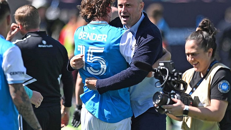 Apr 10, 2022; Charlotte, North Carolina, USA; Charlotte FC head coach Miguel Angel Ramirez celebrates their win against Atlanta United FC at Bank of America Stadium. Mandatory Credit: Griffin Zetterberg-USA TODAY Sports