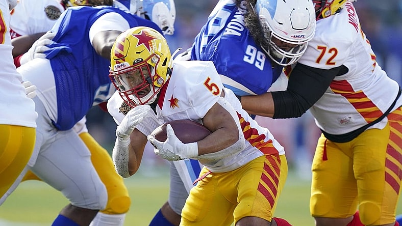 Apr 17, 2022; Birmingham, AL, USA; Philadelphia Stars running back Matt Colburn II (5) carries the ball against New Orleans Breakers during the first half at Protective Stadium. Mandatory Credit: Marvin Gentry-USA TODAY Sports