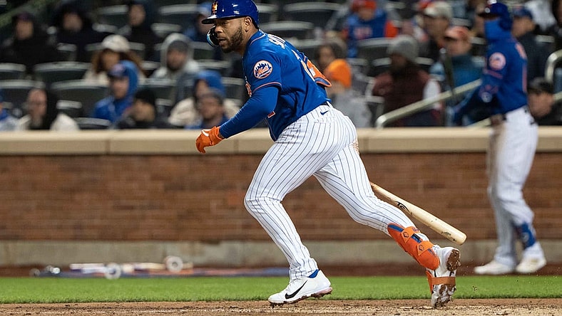Apr 19, 2022; New York City, New York, USA; New York Mets left fielder Dominic Smith (2) hits a single against the San Francisco Giants during the sixth inning at Citi Field. Mandatory Credit: Gregory Fisher-USA TODAY Sports