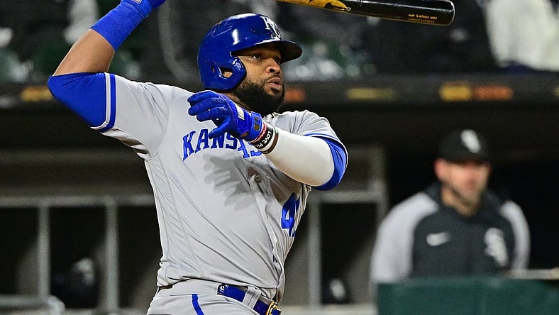 Apr 26, 2022; Chicago, Illinois, USA; Kansas City Royals first baseman Carlos Santana (41) hits a two run single in the sixth inning against the Chicago White Sox at Guaranteed Rate Field. Mandatory Credit: Quinn Harris-USA TODAY Sports