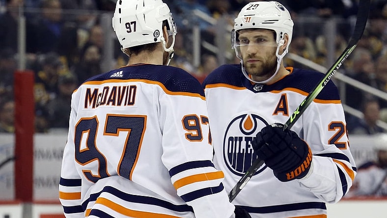 Apr 26, 2022; Pittsburgh, Pennsylvania, USA; Edmonton Oilers center Connor McDavid (97) and center Leon Draisaitl (29) talk prior to a face-off against the Pittsburgh Penguins during the first period at PPG Paints Arena. Mandatory Credit: Charles LeClaire-USA TODAY Sports