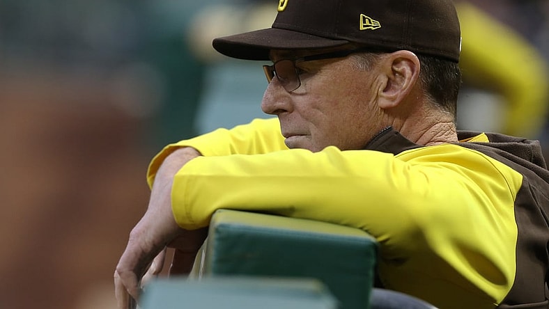 Apr 30, 2022; Pittsburgh, Pennsylvania, USA;  San Diego Padres manager Bob Melvin (3) looks on over he dugout rail against the Pittsburgh Pirates during the fourth inning at PNC Park. Mandatory Credit: Charles LeClaire-USA TODAY Sports