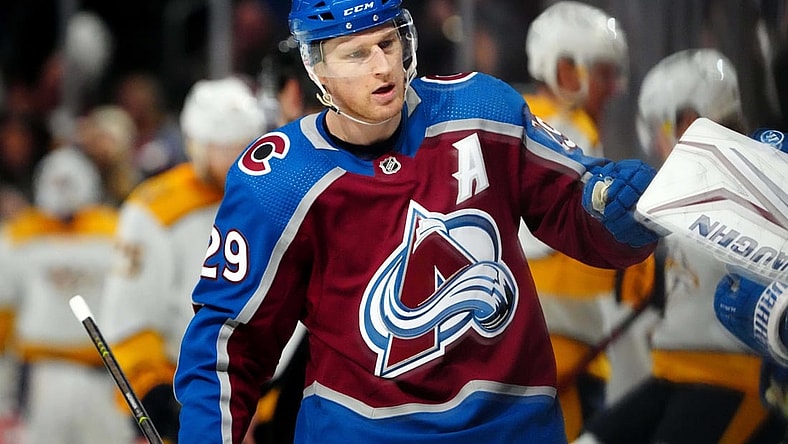 May 3, 2022; Denver, Colorado, USA; Colorado Avalanche center Nathan MacKinnon (29) celebrates his goal in the third period of game one against the Nashville Predators of the first round of the 2022 Stanley Cup Playoffs at Ball Arena. Mandatory Credit: Ron Chenoy-USA TODAY Sports