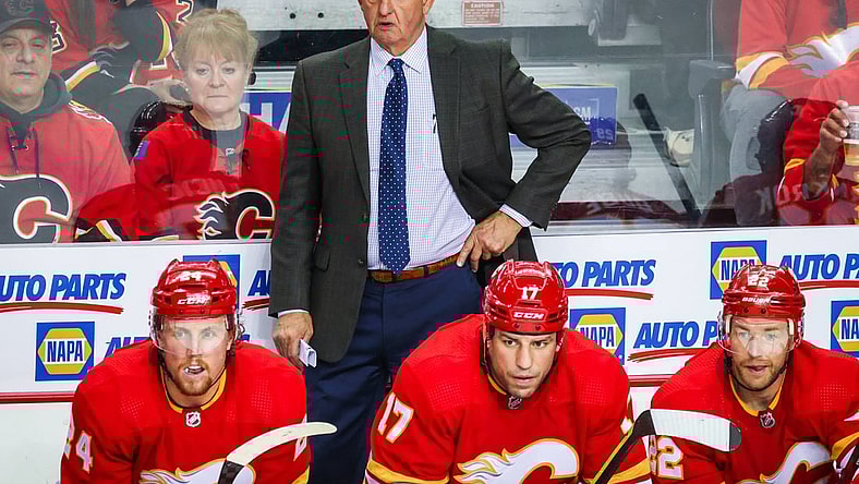 May 3, 2022; Calgary, Alberta, CAN; Calgary Flames head coach Darryl Sutter on his bench against the Dallas Stars during the second period in game one of the first round of the 2022 Stanley Cup Playoffs at Scotiabank Saddledome. Mandatory Credit: Sergei Belski-USA TODAY Sports