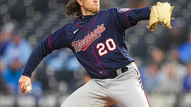 Apr 20, 2022; Kansas City, Missouri, USA; Minnesota Twins starting pitcher Chris Paddack (20) pitches against the Kansas City Royals during the first inning at Kauffman Stadium. Mandatory Credit: Jay Biggerstaff-USA TODAY Sports