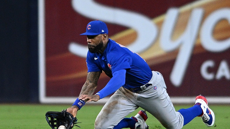 May 9, 2022; San Diego, California, USA; Chicago Cubs center fielder Jason Heyward (22) makes a diving catch on a line drive hit by San Diego Padres shortstop Ha-Seong Kim (not pictured) during the seventh inning at Petco Park. Mandatory Credit: Orlando Ramirez-USA TODAY Sports