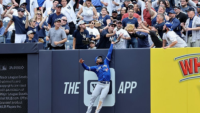 May 11, 2022; Bronx, New York, USA; Toronto Blue Jays right fielder Teoscar Hernandez (37) can't catch a three run home run by New York Yankees second baseman Gleyber Torres (not pictured) during the fourth inning at Yankee Stadium. Mandatory Credit: Brad Penner-USA TODAY Sports