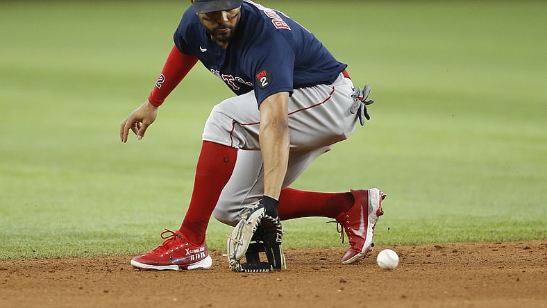 May 15, 2022; Arlington, Texas, USA; Boston Red Sox shortstop Xander Bogaerts (2) fields a ground ball in the fifth inning against the Texas Rangers at Globe Life Field. Mandatory Credit: Tim Heitman-USA TODAY Sports