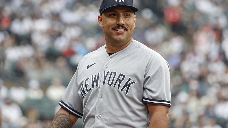 May 15, 2022; Chicago, Illinois, USA; New York Yankees starting pitcher Nestor Cortes (65) smiles as he returns to dugout after pitching against the Chicago White Sox during the eight inning at Guaranteed Rate Field. Mandatory Credit: Kamil Krzaczynski-USA TODAY Sports