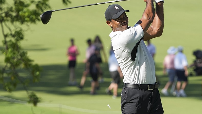 May 16, 2022; Tulsa, Oklahoma, USA; Tiger Woods hits his tee shot on the 13th hole during a practice round for the PGA Championship golf tournament at Southern Hills Country Club. Mandatory Credit: Michael Madrid-USA TODAY Sports