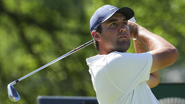 May 16, 2022; Tulsa, Oklahoma, USA; Scottie Scheffler hits his tee shot 14 during a practice round for the PGA Championship golf tournament at Southern Hills Country Club. Mandatory Credit: Michael Madrid-USA TODAY Sports