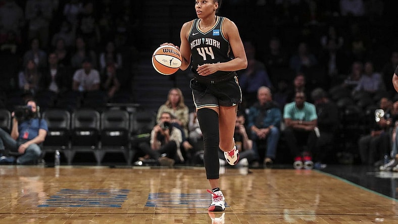 May 17, 2022; Brooklyn, New York, USA;  New York Liberty forward Betnijah Laney (44) brings the ball up court in the second quarter against the Connecticut Sun at Barclays Center. Mandatory Credit: Wendell Cruz-USA TODAY Sports