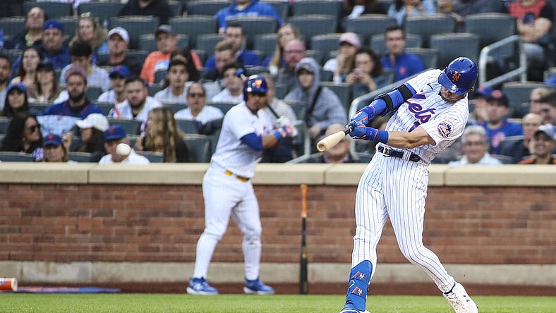 May 18, 2022; New York City, New York, USA;  New York Mets second baseman Jeff McNeil (1) hits a two run single in the first inning against the St. Louis Cardinals at Citi Field. Mandatory Credit: Wendell Cruz-USA TODAY Sports