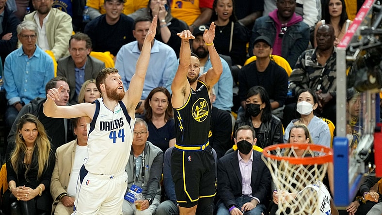 May 18, 2022; San Francisco, California, USA; Golden State Warriors guard Stephen Curry (30) shoots against Dallas Mavericks forward Davis Bertans (44) during the first quarter of game one of the 2022 western conference finals at Chase Center. Mandatory Credit: Darren Yamashita-USA TODAY Sports