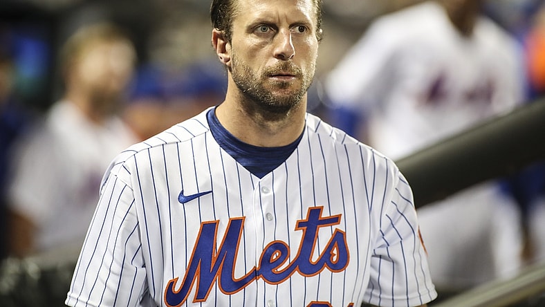May 18, 2022; New York City, New York, USA; New York Mets starting pitcher Max Scherzer (21) looks out from the dugout in the fifth inning against the St. Louis Cardinals at Citi Field. Mandatory Credit: Wendell Cruz-USA TODAY Sports