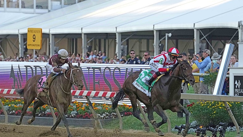 May 21, 2022; Baltimore, MD, USA; Early Voting with jockey Jose Ortiz wins the Preakness Stakes ahead of Epicenter (left) at Pimlico Race Course. Mandatory Credit: Mitch Stringer-USA TODAY Sports