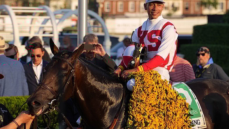 May 21, 2022; Baltimore, MD, USA; Early Voting jockey Jose Ortiz aboard in the winners circle after the Preakness Stakes at Pimlico Race Course. Mandatory Credit: Mitch Stringer-USA TODAY Sports