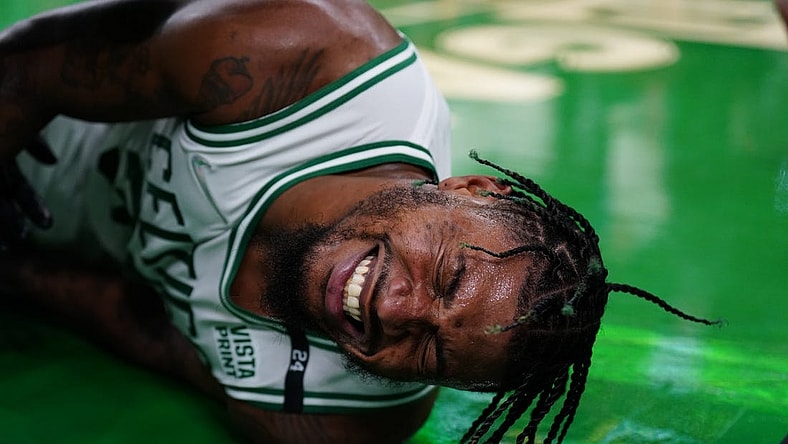 May 21, 2022; Boston, Massachusetts, USA; Boston Celtics guard Marcus Smart (36) reacts after suffering an apparent injury to his ankle against the Miami Heat n the third quarter during game three of the 2022 eastern conference finals at TD Garden. Mandatory Credit: David Butler II-USA TODAY Sports