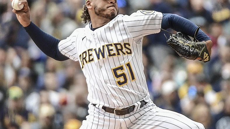 May 22, 2022; Milwaukee, Wisconsin, USA; Milwaukee Brewers pitcher Freddy Peralta (51) throws a pitch in the third inning against the Washington Nationals at American Family Field. Mandatory Credit: Benny Sieu-USA TODAY Sports