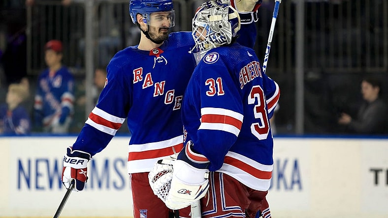 May 22, 2022; New York, New York, USA; New York Rangers left wing Chris Kreider (20) celebrates a 3-1 win against the Carolina Hurricanes with New York Rangers goalie Igor Shesterkin (31) in game three of the second round of the 2022 Stanley Cup Playoffs at Madison Square Garden. Mandatory Credit: Danny Wild-USA TODAY Sports
