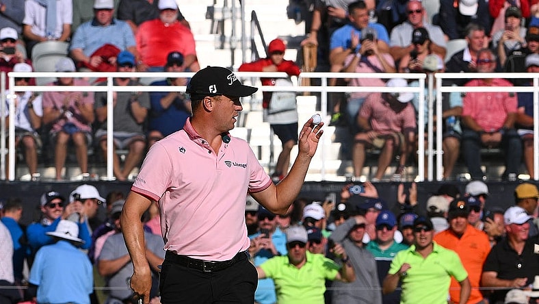 May 22, 2022; Tulsa, OK, USA; Justin Thomas acknowledges the crowd after a putt on the 17th green during the final round of the PGA Championship golf tournament at Southern Hills Country Club. Mandatory Credit: Orlando Ramirez-USA TODAY Sports