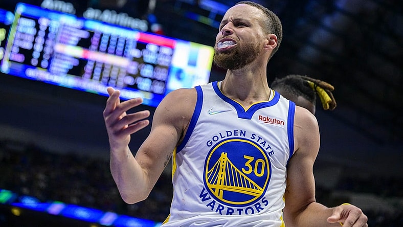 May 22, 2022; Dallas, Texas, USA; Golden State Warriors guard Stephen Curry (30) reacts to being fouled by Dallas Mavericks forward Reggie Bullock (25) during the third quarter in game three of the 2022 western conference finals at American Airlines Center. Mandatory Credit: Jerome Miron-USA TODAY Sports